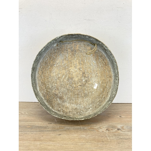 487 - A circular brass hanging dinner gong - approx. 39cm diameter