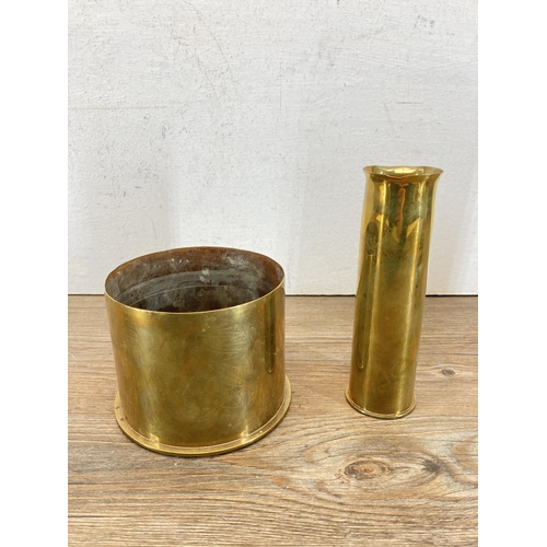 492 - Four military brass shell cases - largest approx. 20cm high