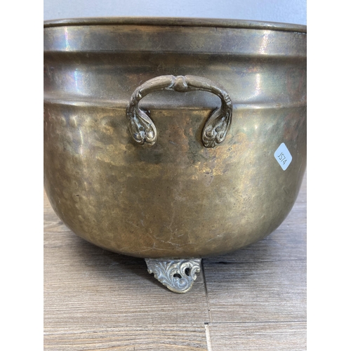 496 - Four pieces of copper and brassware to include jug, coal scuttle, coal bucket etc.