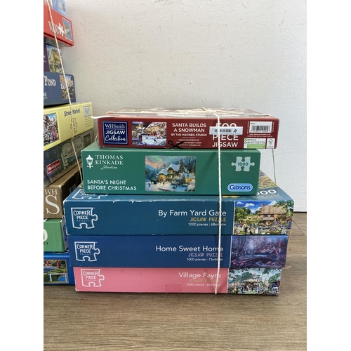 507 - A collection of boxed jigsaw puzzles and Hornby 