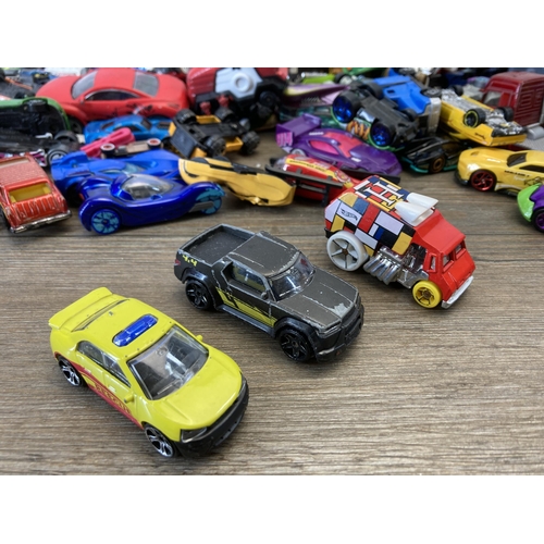 509 - A box containing various die-cast model vehicles to include Corgi, Zuru Metal Machines, Hot Wheels e... 