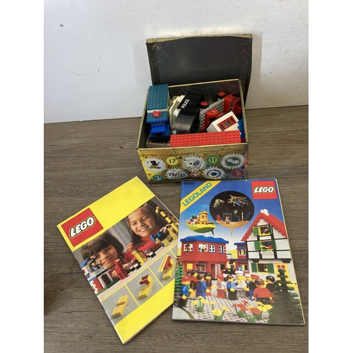 515 - A collection of 1970s Lego construction sets and accessories to include 375 Yellow Castle, 182 Train... 