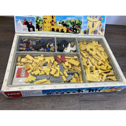 515 - A collection of 1970s Lego construction sets and accessories to include 375 Yellow Castle, 182 Train... 