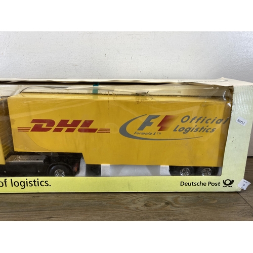 525 - A boxed Dickie DHL remote control model lorry