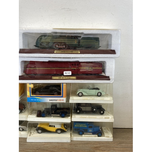 526 - A collection of boxed model locomotives and die-cast vehicles to include Solido, Corgi etc.