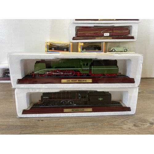 526 - A collection of boxed model locomotives and die-cast vehicles to include Solido, Corgi etc.