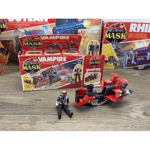 527 - A collection of 1986 boxed Kenner M.A.S.K. toys to include Rhino, Outlaw, Thunderhawk, Vampire etc.