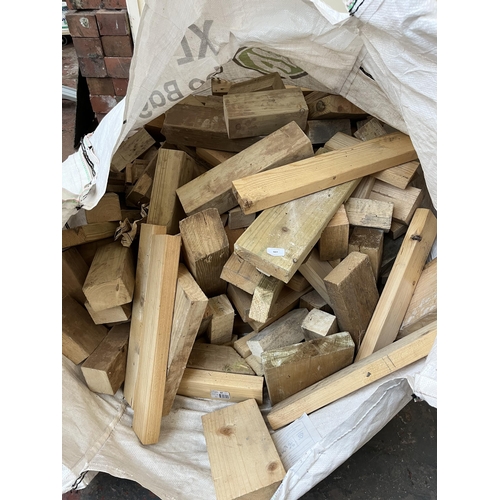 883 - A very large collection of wooden planks and cut offs ideal for fire pits or log burners