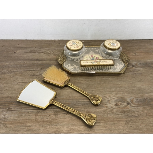 573 - A mid 20th century Petit Point six piece dressing table set