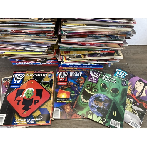 581 - A large collection of 2000 AD and Judge Dredd annuals, comics and magazines to include 2000 AD Octob... 