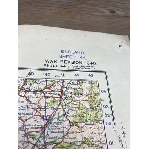 591 - A collection of vintage military books and maps to include Daily Express War Map of Belgium and Holl... 