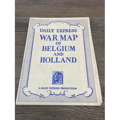 591 - A collection of vintage military books and maps to include Daily Express War Map of Belgium and Holl... 