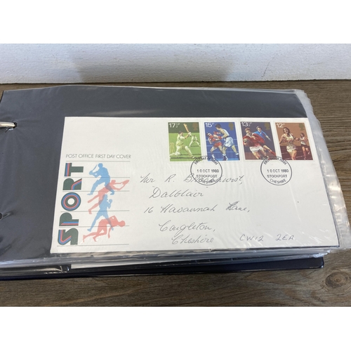 593 - Two Stuart albums containing First Day Covers