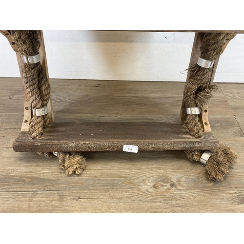 596 - A reclaimed wood and rope three tier wall hanging shelf - approx. 68cm high x 53cm wide