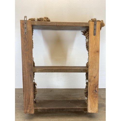 596 - A reclaimed wood and rope three tier wall hanging shelf - approx. 68cm high x 53cm wide