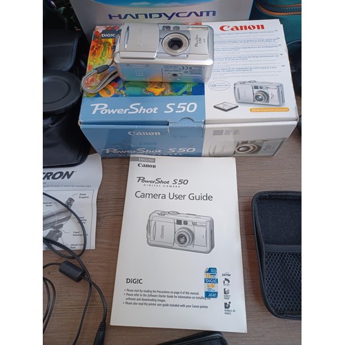 683 - Five items, one boxed and cased Canon IXUS 100 IS 12.1mp compact digital camera with charger and sof... 