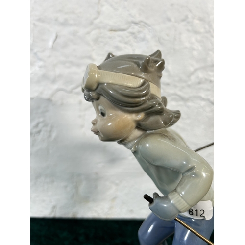 310 - A Lladro Sport Billy Productions Skier figurine - approx. 21cm high