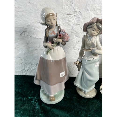 312 - Three porcelain figurines, one Nao and two Lladro