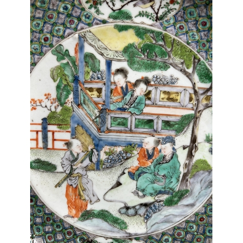 317 - A 19th century Chinese Famille Verte hand painted porcelain charger - approx. 20cm diameter