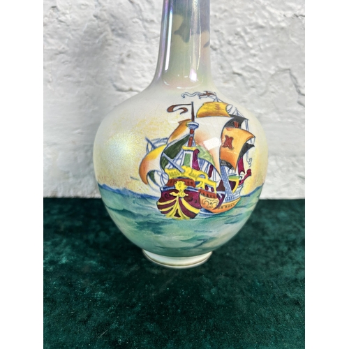 319 - A Coronet England lusterware ship scene bottle neck vase - approx. 23cm high