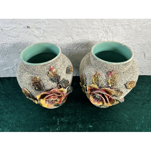 322 - A pair of Victorian Sand Majolica floral vases - approx. 24cm high