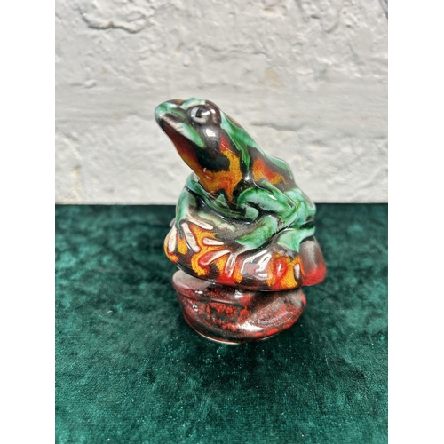 328 - An Anita Harris frog figurine - approx. 10cm high