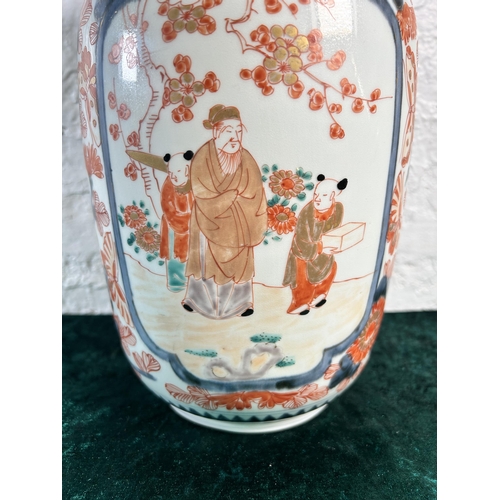 335 - An Oriental Imari porcelain vase - approx. 31cm high