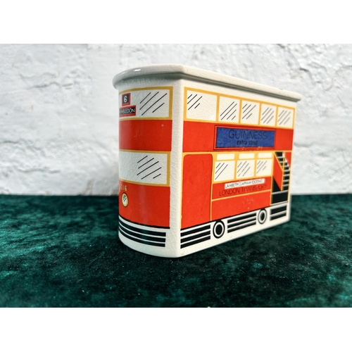 339 - A Carlton Ware Guinness advertising London Transport Bus money box - approx. 10cm high x 6.5cm wide ... 