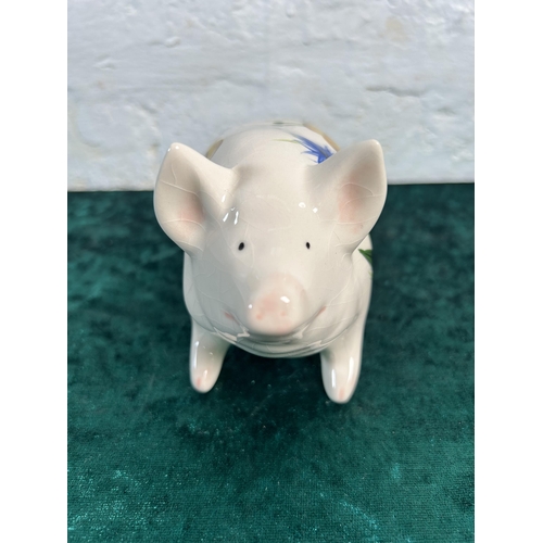 340 - A Griselda Hill Pottery Wemyss Ware pig figurine - approx. 8cm high x 16cm long