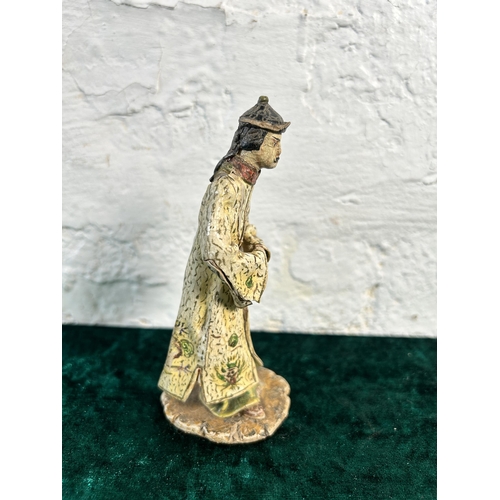 342 - A 19th century Chinese papier-mâché figurine - approx. 12cm high