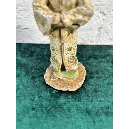 342 - A 19th century Chinese papier-mâché figurine - approx. 12cm high