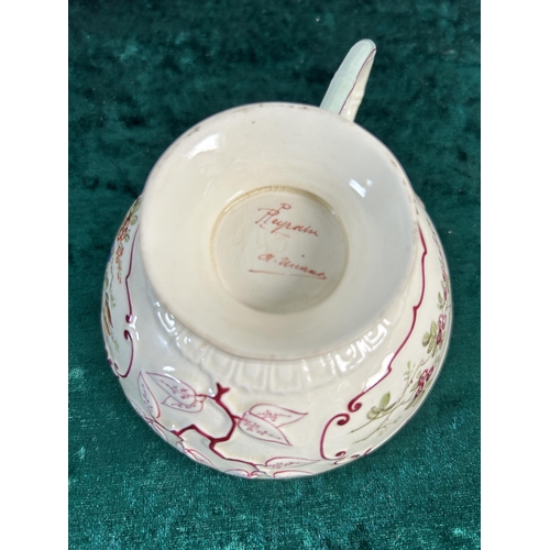 351 - A 19th century hand painted porcelain cup and saucer, signed and stamped to base