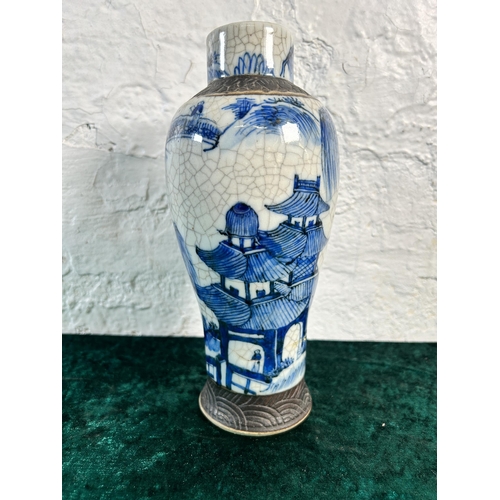 352 - A Chinese blue and white crackle glazed porcelain vase - approx. 24cm high