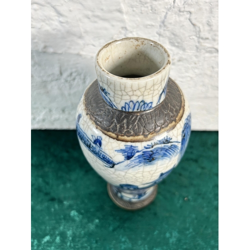 352 - A Chinese blue and white crackle glazed porcelain vase - approx. 24cm high