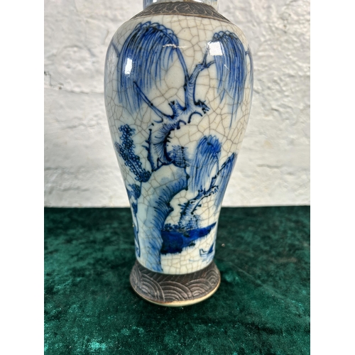 352 - A Chinese blue and white crackle glazed porcelain vase - approx. 24cm high