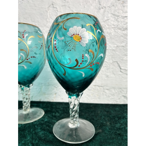 355 - A pair of Victorian hand painted turquoise glass vases - approx. 23cm high