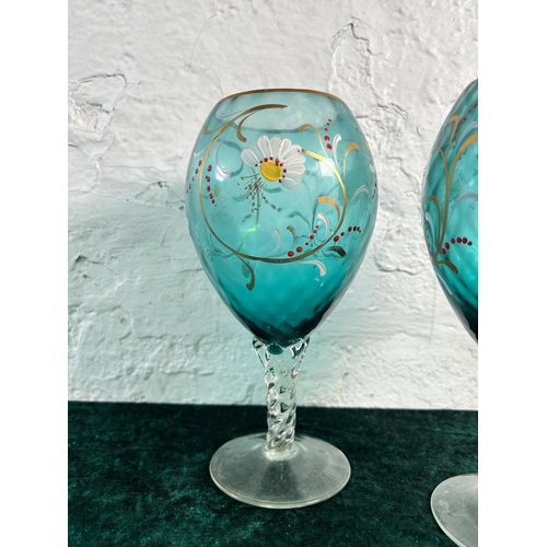 355 - A pair of Victorian hand painted turquoise glass vases - approx. 23cm high