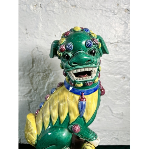 362 - A Chinese Wucai polychrome glazed porcelain foo dog figurine - approx. 35cm high