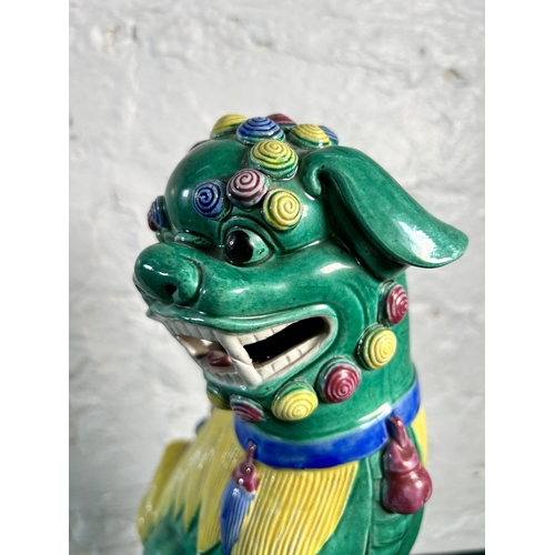 362 - A Chinese Wucai polychrome glazed porcelain foo dog figurine - approx. 35cm high