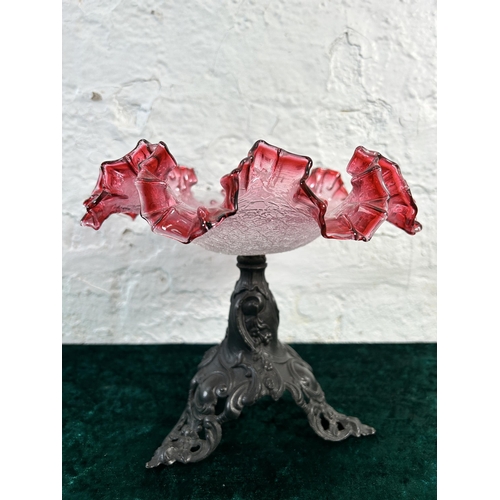 372 - A Victorian style cranberry glass and cast metal pedestal dish - approx. 27cm high x 22cm diameter