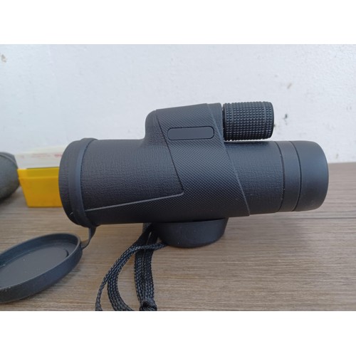 688 - Three items, one pair of Tasco Zip 7x-15 x 35 binoculars, one 10 x 40 monocular and one collection o... 