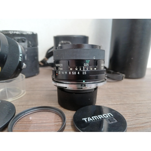 682 - Three cased Tamron items, one 1:2.5 28mm lens for Nikon, one 1:3.8-4 70-210mm lens for Rollei and on... 