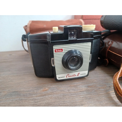 687 - A collection of optical and camera equipment to include cased Canon Canonet QL25 35mm rangefinder ca... 