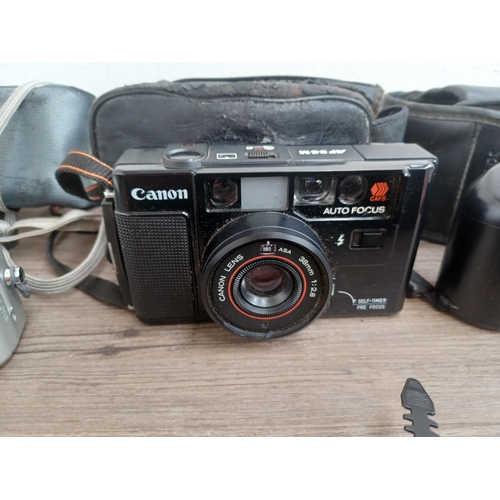 690 - A collection of Canon items to include boxed and cased IXUS 200 IS 12.1mp compact digital camera wit... 