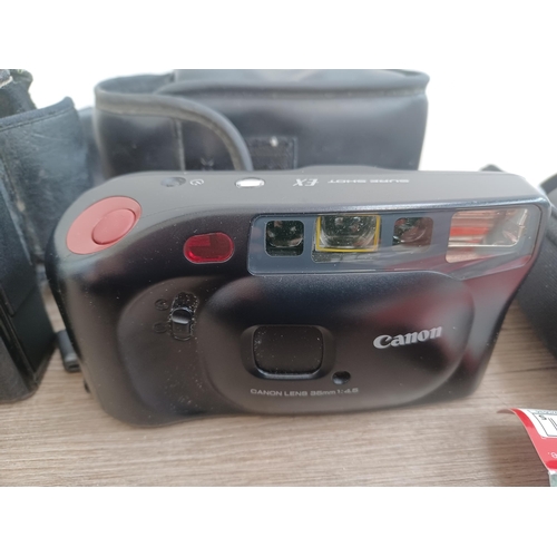 690 - A collection of Canon items to include boxed and cased IXUS 200 IS 12.1mp compact digital camera wit... 