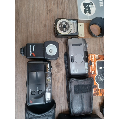 694 - A collection of cameras and photography equipment to include cased KMZ Zenit TTL 35mm SLR camera wit... 