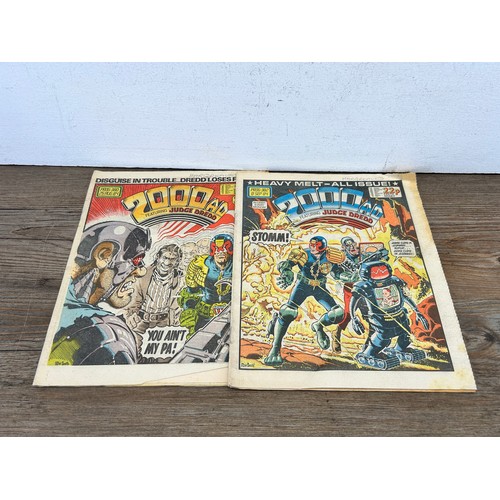 581 - A large collection of 2000 AD and Judge Dredd annuals, comics and magazines to include 2000 AD Octob... 