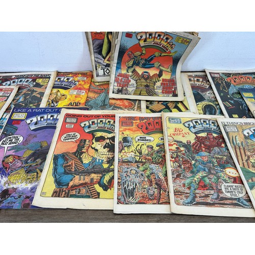 581 - A large collection of 2000 AD and Judge Dredd annuals, comics and magazines to include 2000 AD Octob... 