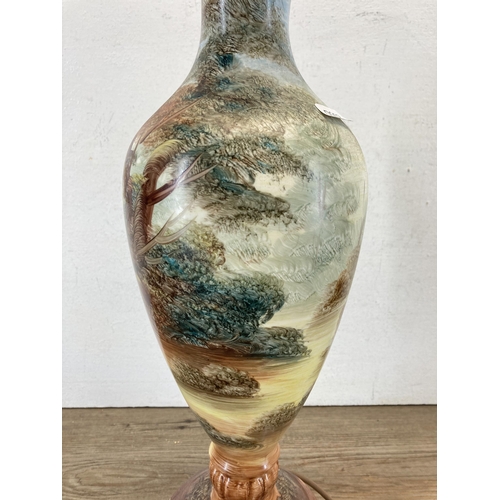 613 - A 19th century style hand painted porcelain table lamp on onyx base - approx. 60cm high