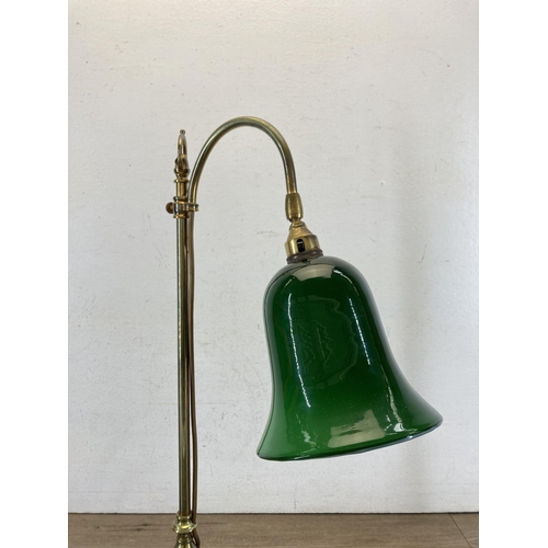 616 - A brass and green glass desk lamp - approx. 56cm high